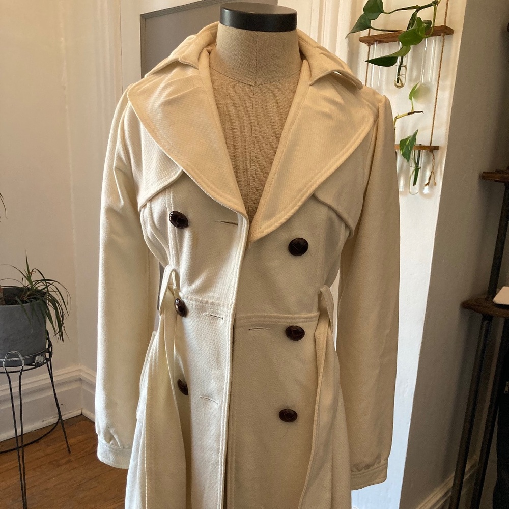 Cream colored feminine trench coat